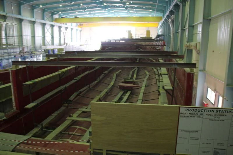 a large room with a few escalators aboard JEWEL Yacht for Sale