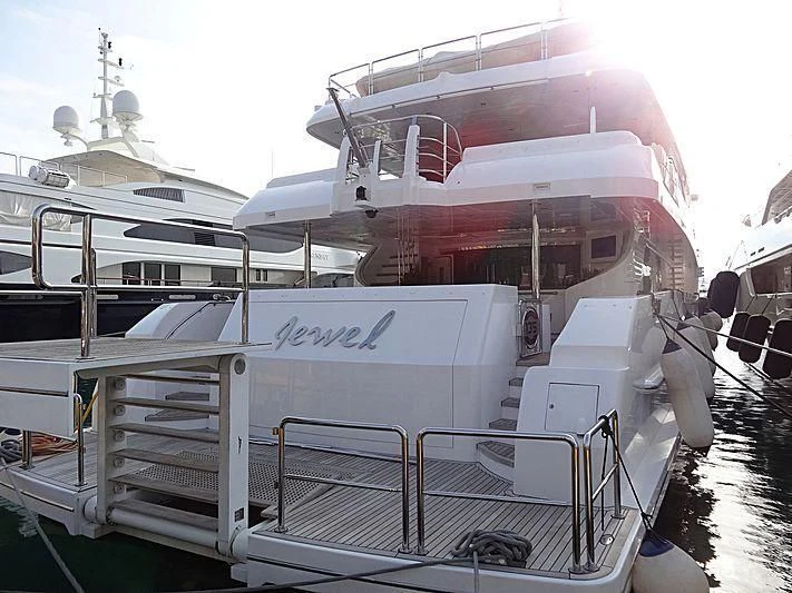 a large white boat aboard JEWEL Yacht for Sale