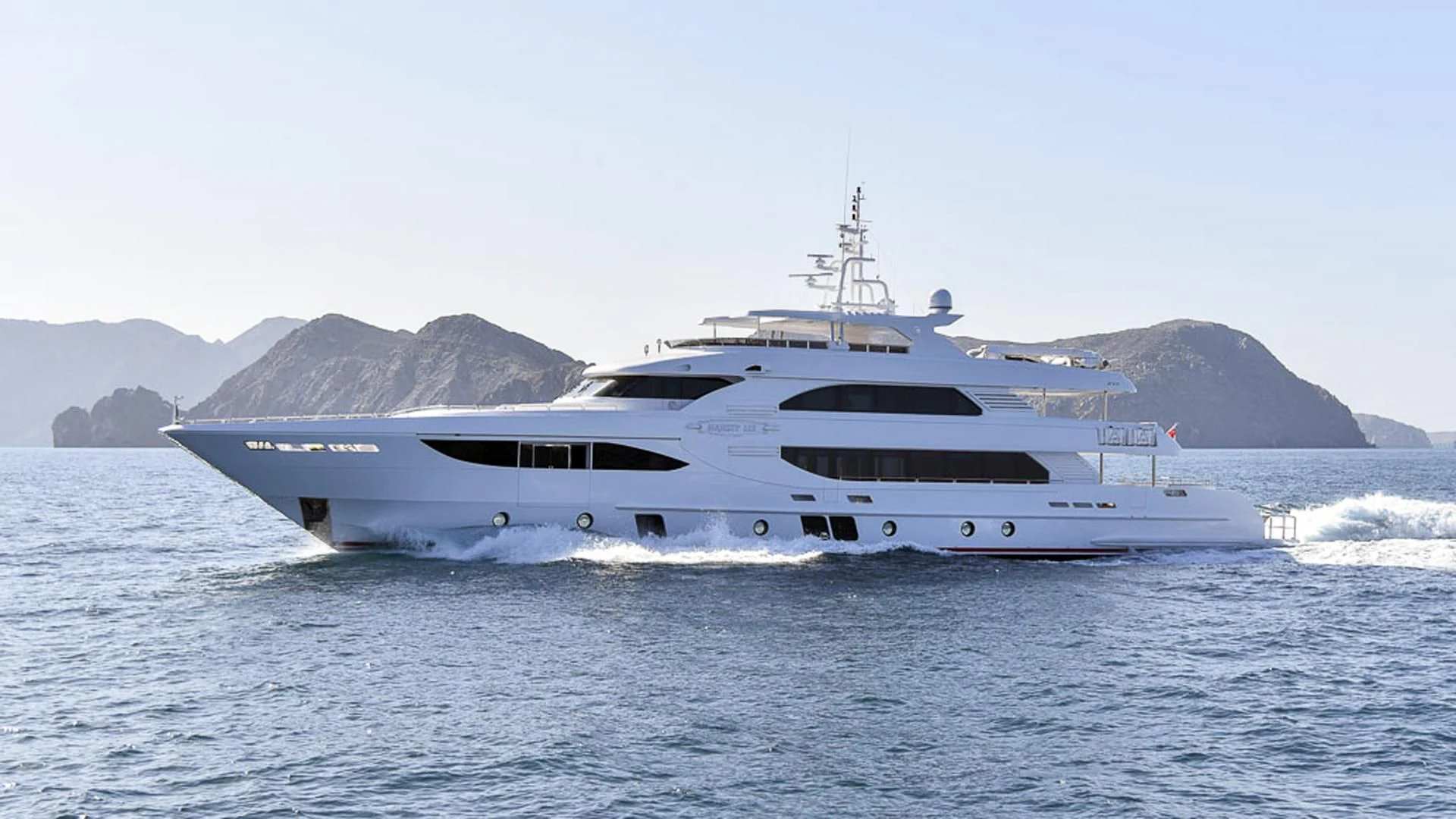 a large white boat in the water aboard JEWEL Yacht for Sale