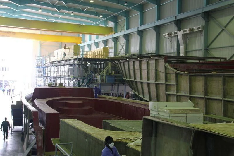 a large warehouse with several racks aboard JEWEL Yacht for Sale