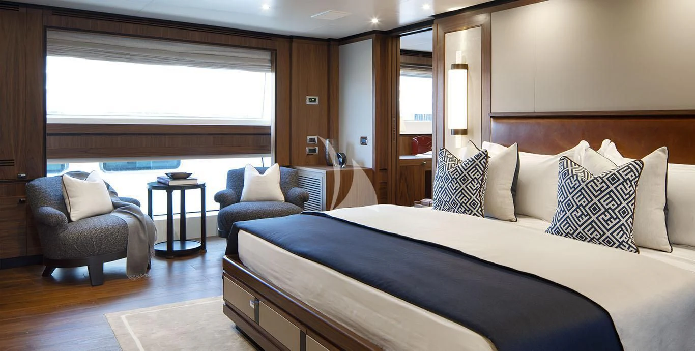 a large bed in a room aboard RANIA Yacht for Sale