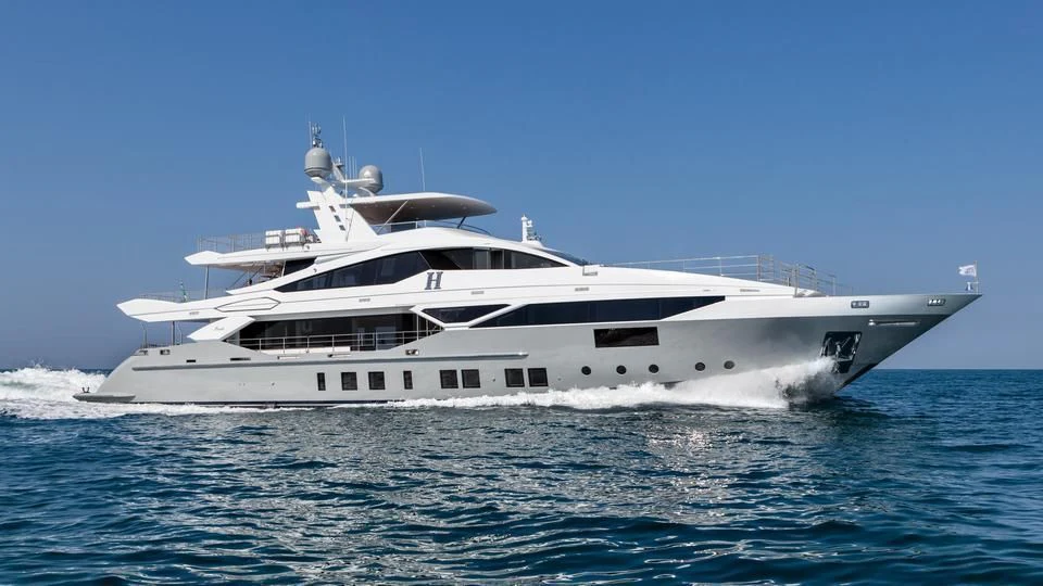 a large white ship in the water aboard RANIA Yacht for Sale
