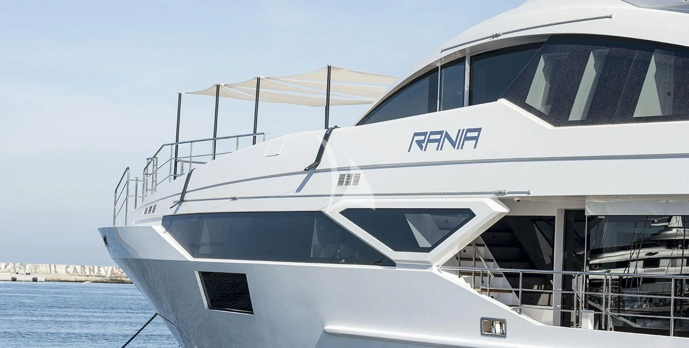a white yacht on the water aboard RANIA Yacht for Sale