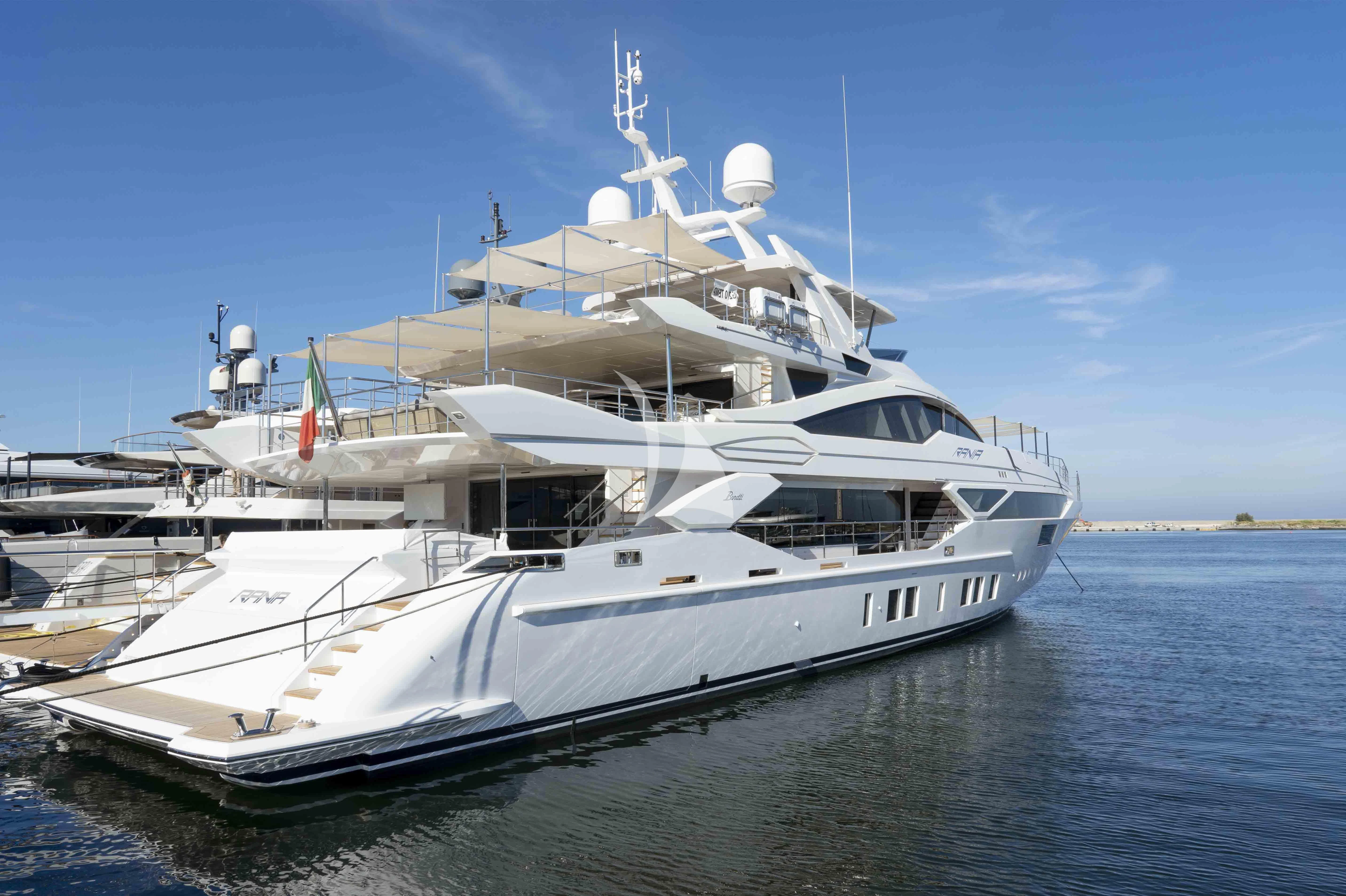 a large white boat in the water aboard RANIA Yacht for Sale