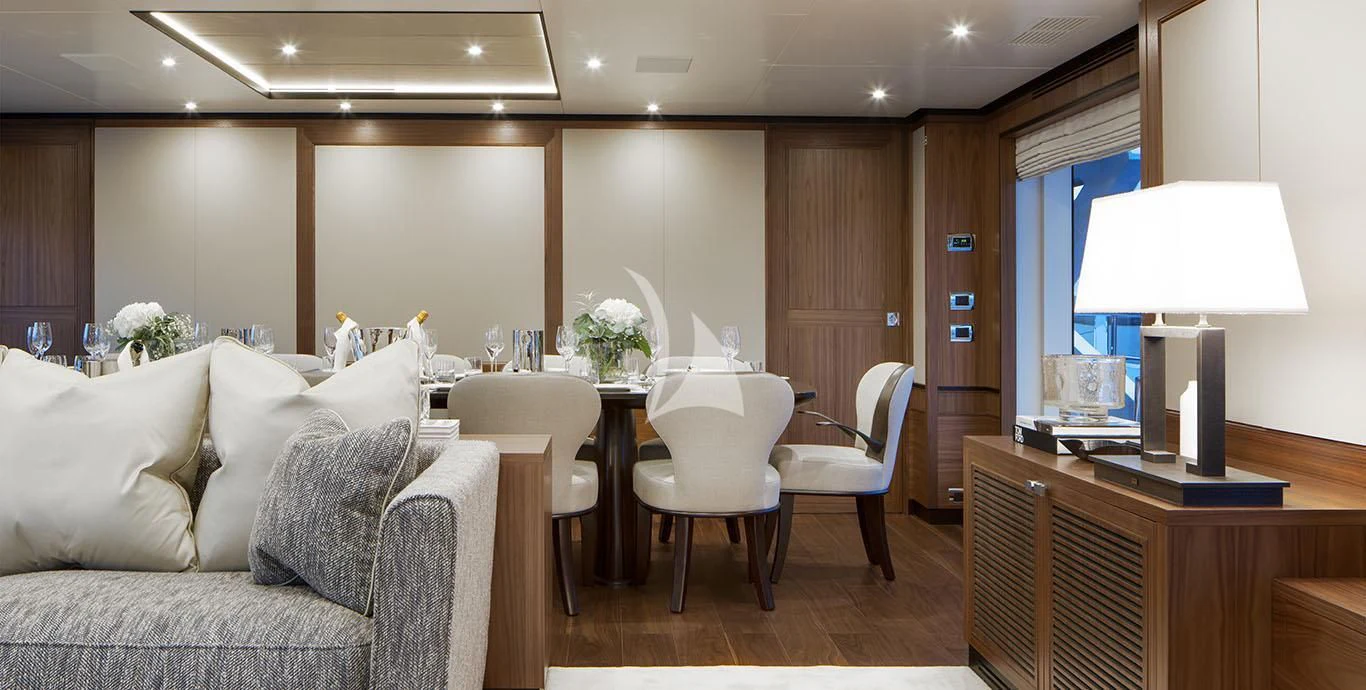 a living room with a couch and a table aboard RANIA Yacht for Sale