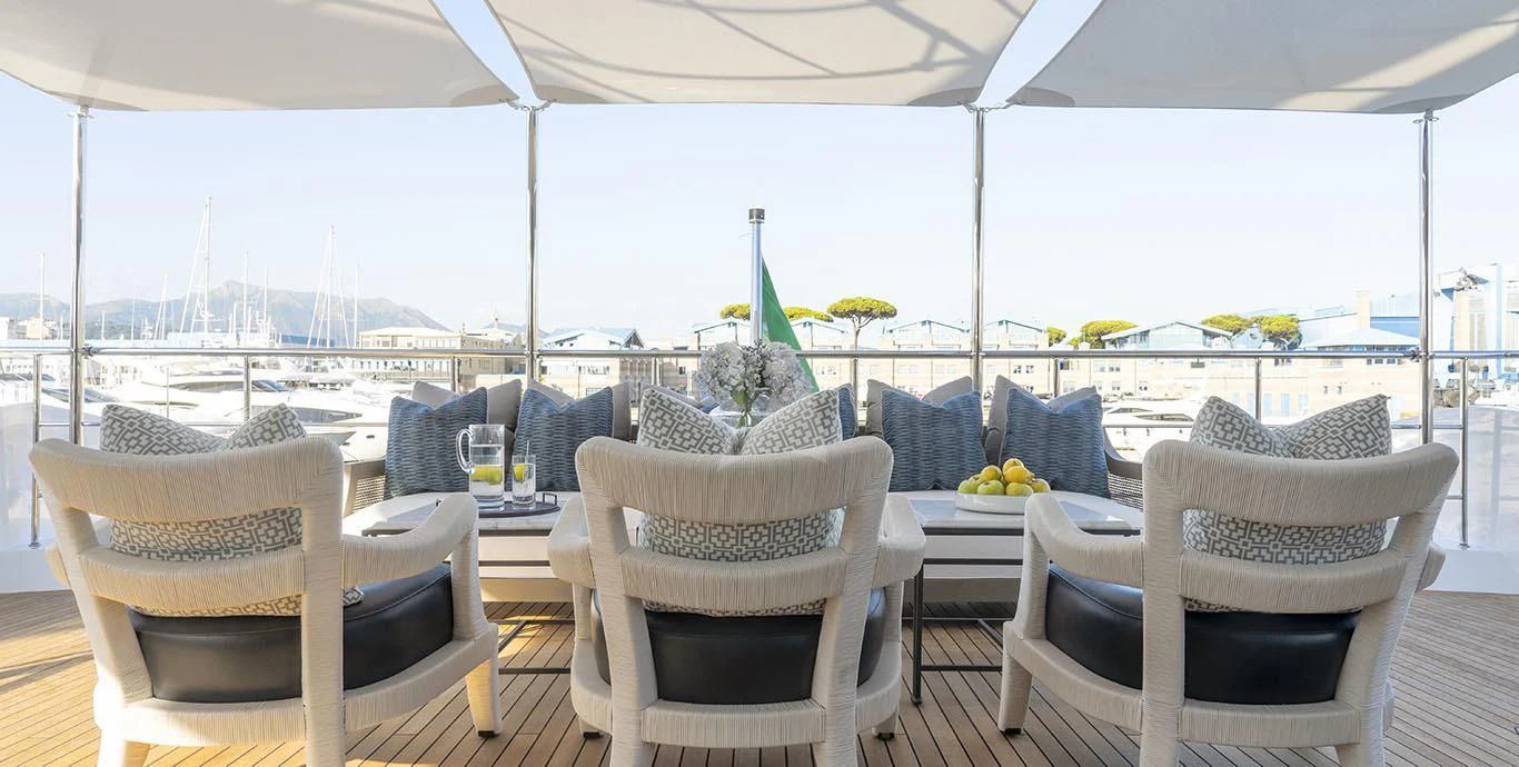 a group of chairs around a table aboard RANIA Yacht for Sale