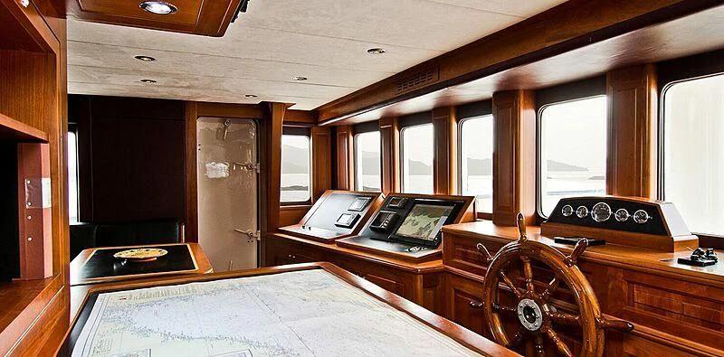 a room with a desk and a chair aboard SUNNY HILL Yacht for Sale