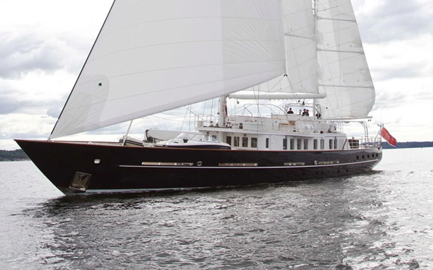 a large boat on the water aboard SUNNY HILL Yacht for Sale