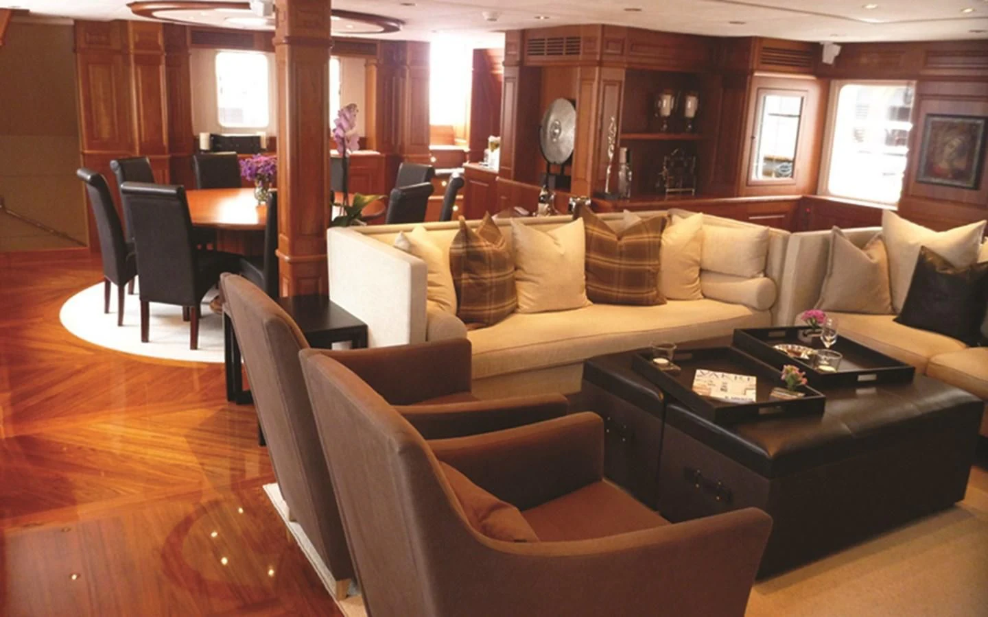 a living room with a couch and a table aboard SUNNY HILL Yacht for Sale