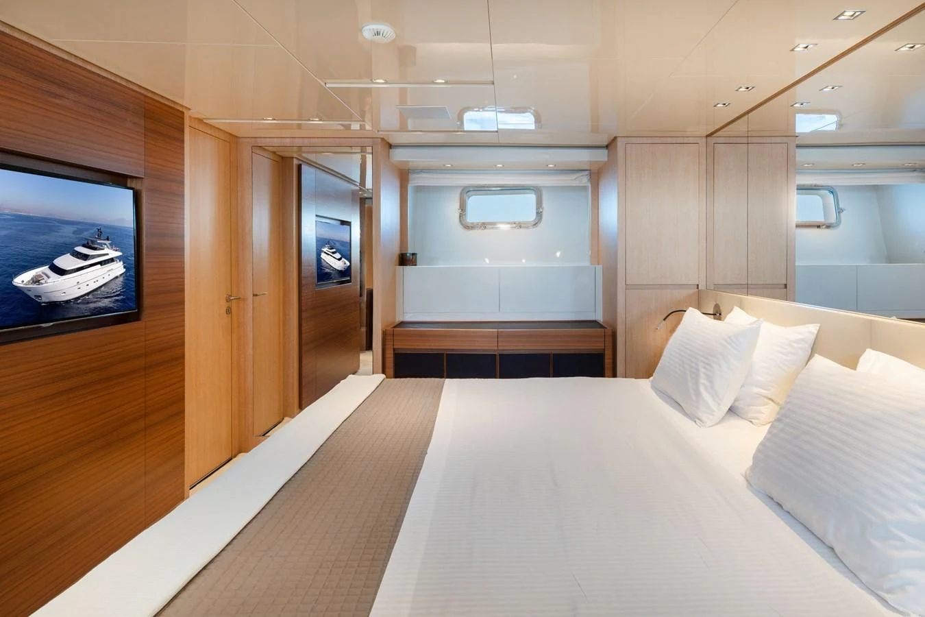 a bed in a room aboard VITTORIA I Yacht for Sale
