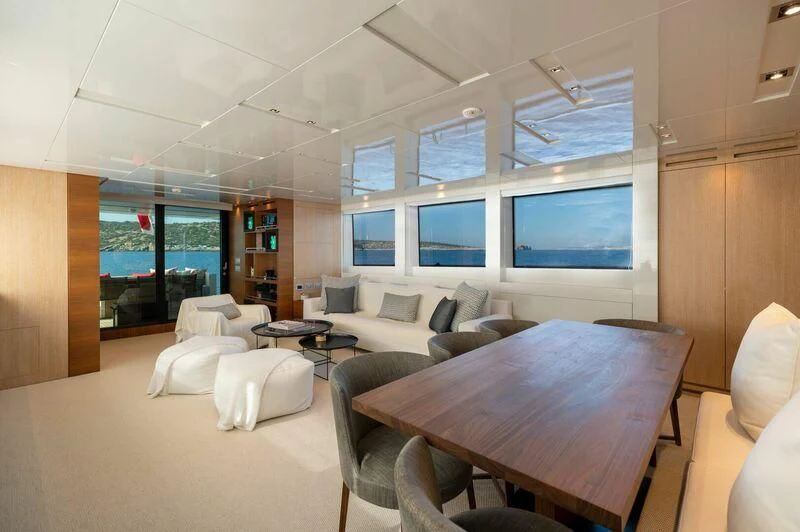a room with a bed and a table aboard VITTORIA I Yacht for Sale