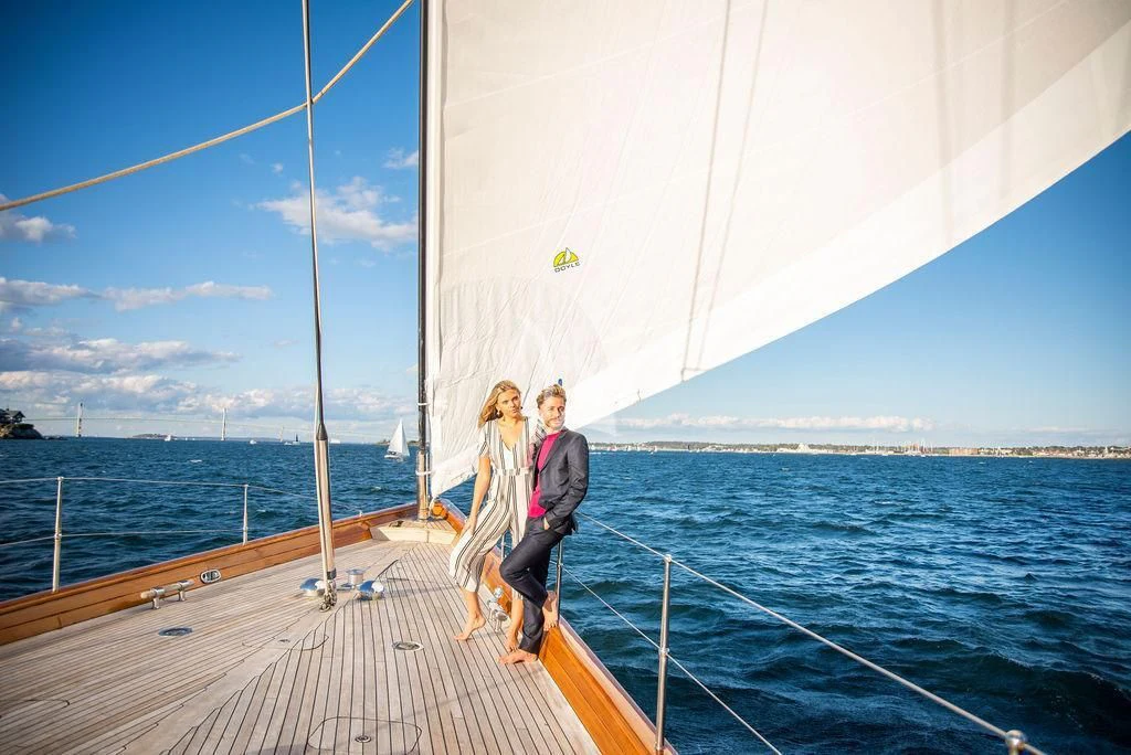 a couple of people on a boat aboard AURELIUS Yacht for Sale