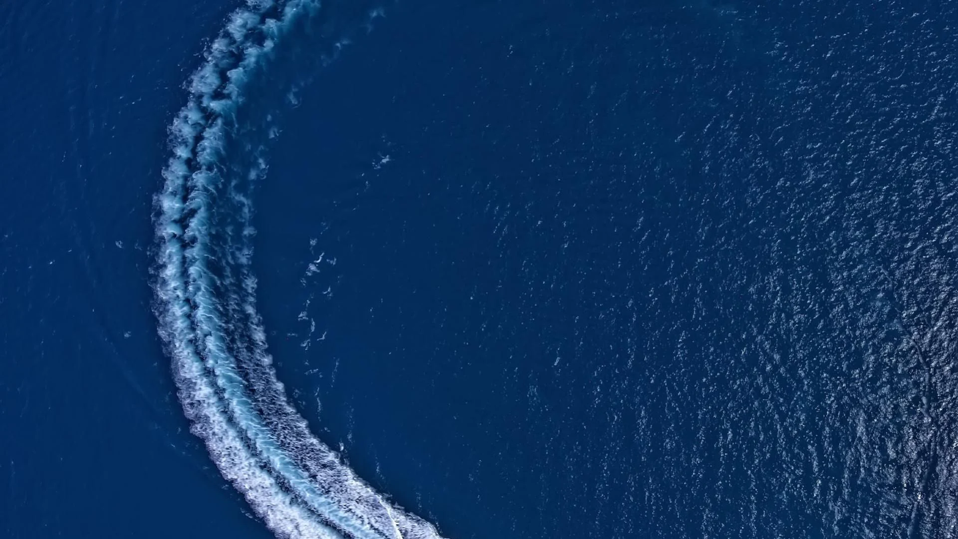 a large wave in the ocean aboard AURELIUS Yacht for Sale