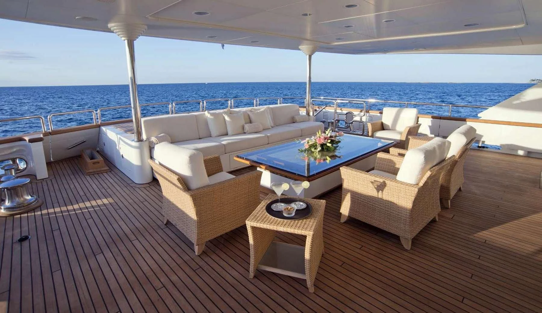 a living room with a large ocean aboard BARENTS Yacht for Charter