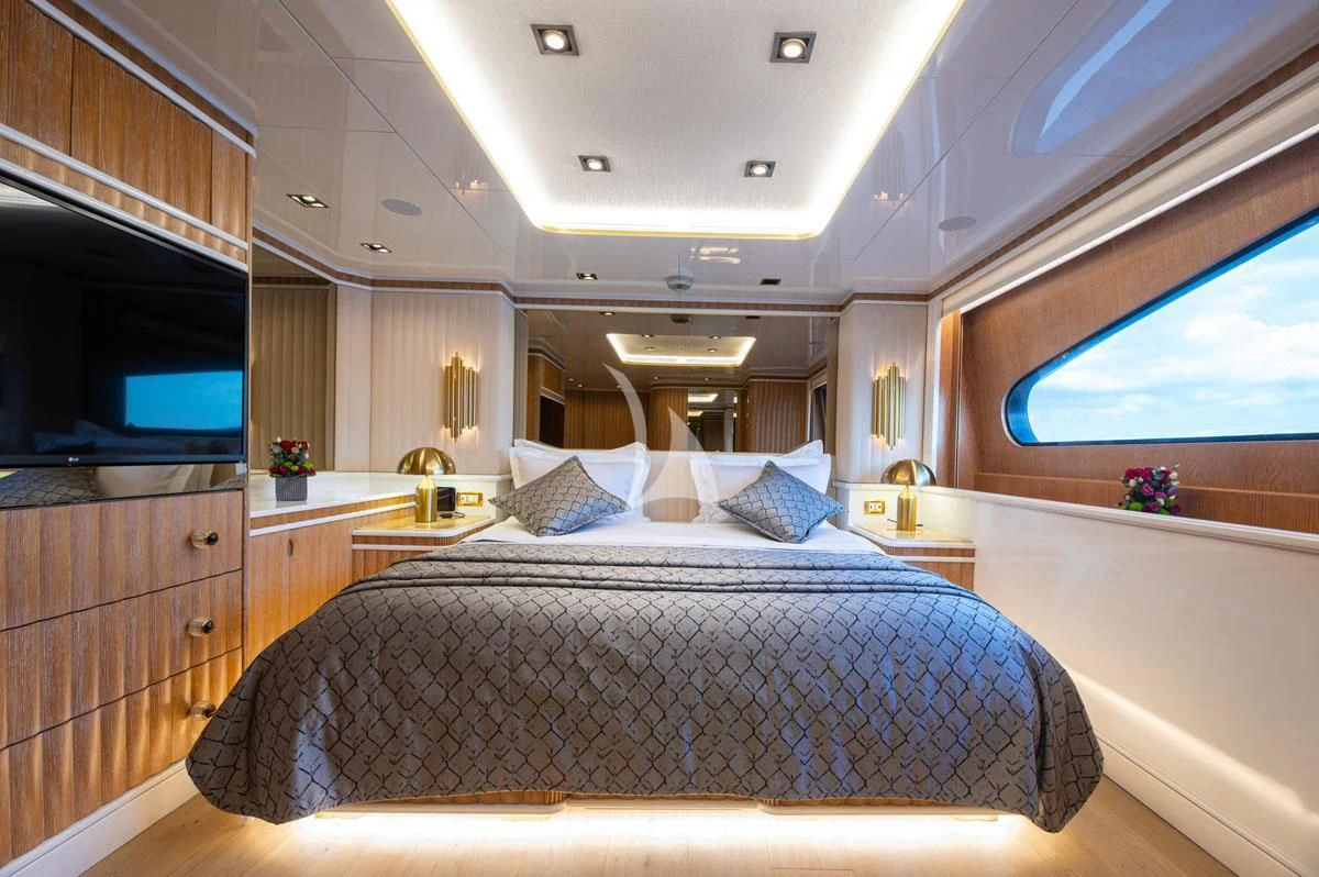 a large bed in a room aboard BARENTS Yacht for Charter