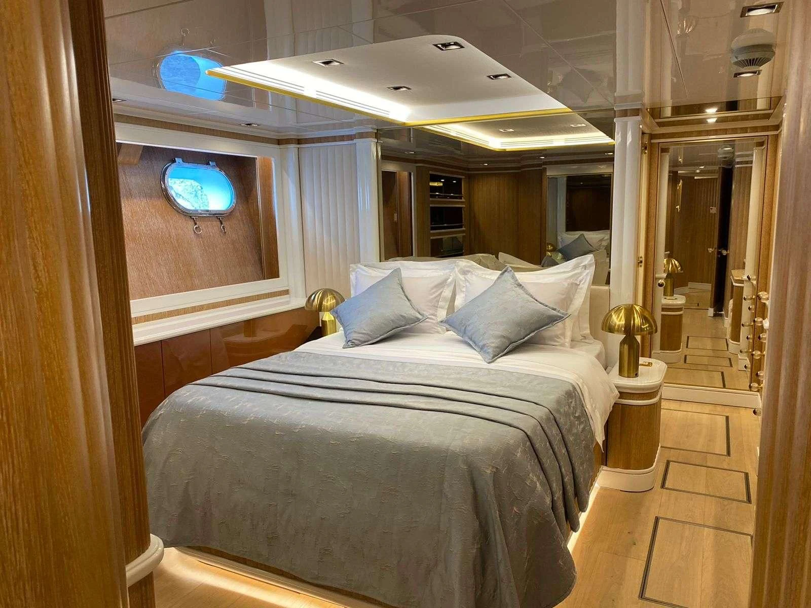 a bed in a room aboard BARENTS Yacht for Charter