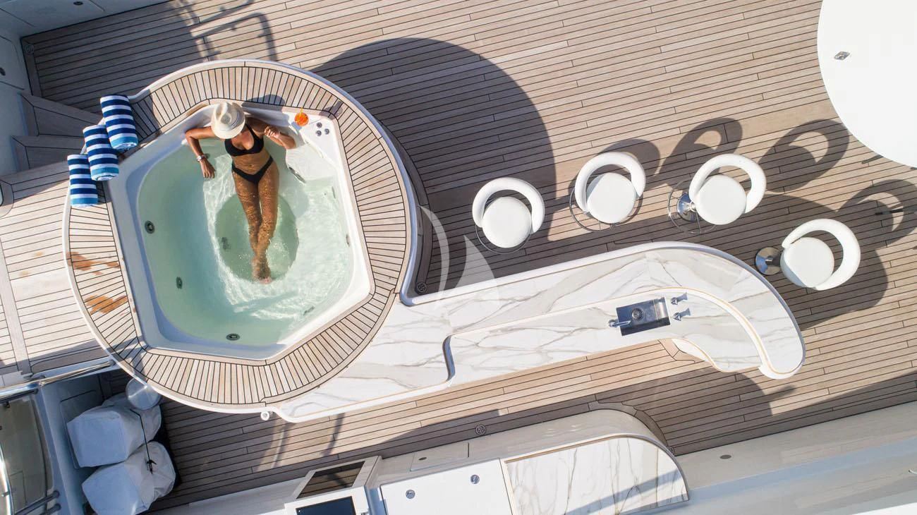 a person standing on a building aboard BARENTS Yacht for Charter