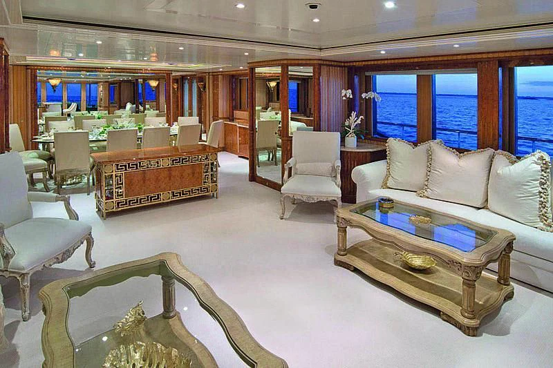 a living room with a couch and a table aboard BARENTS Yacht for Charter