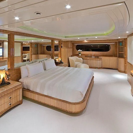 a large bedroom with a large bed aboard BARENTS Yacht for Charter