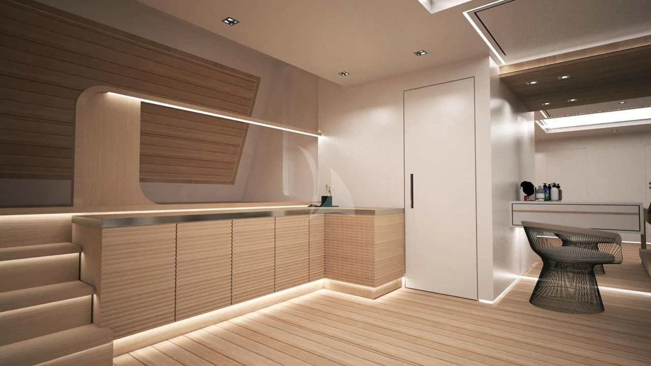 a room with a staircase and a table aboard BARENTS Yacht for Charter