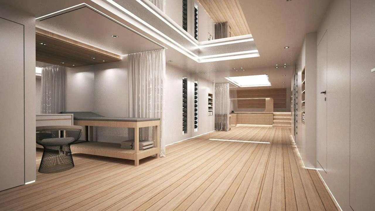 a room with a table and chairs aboard BARENTS Yacht for Charter