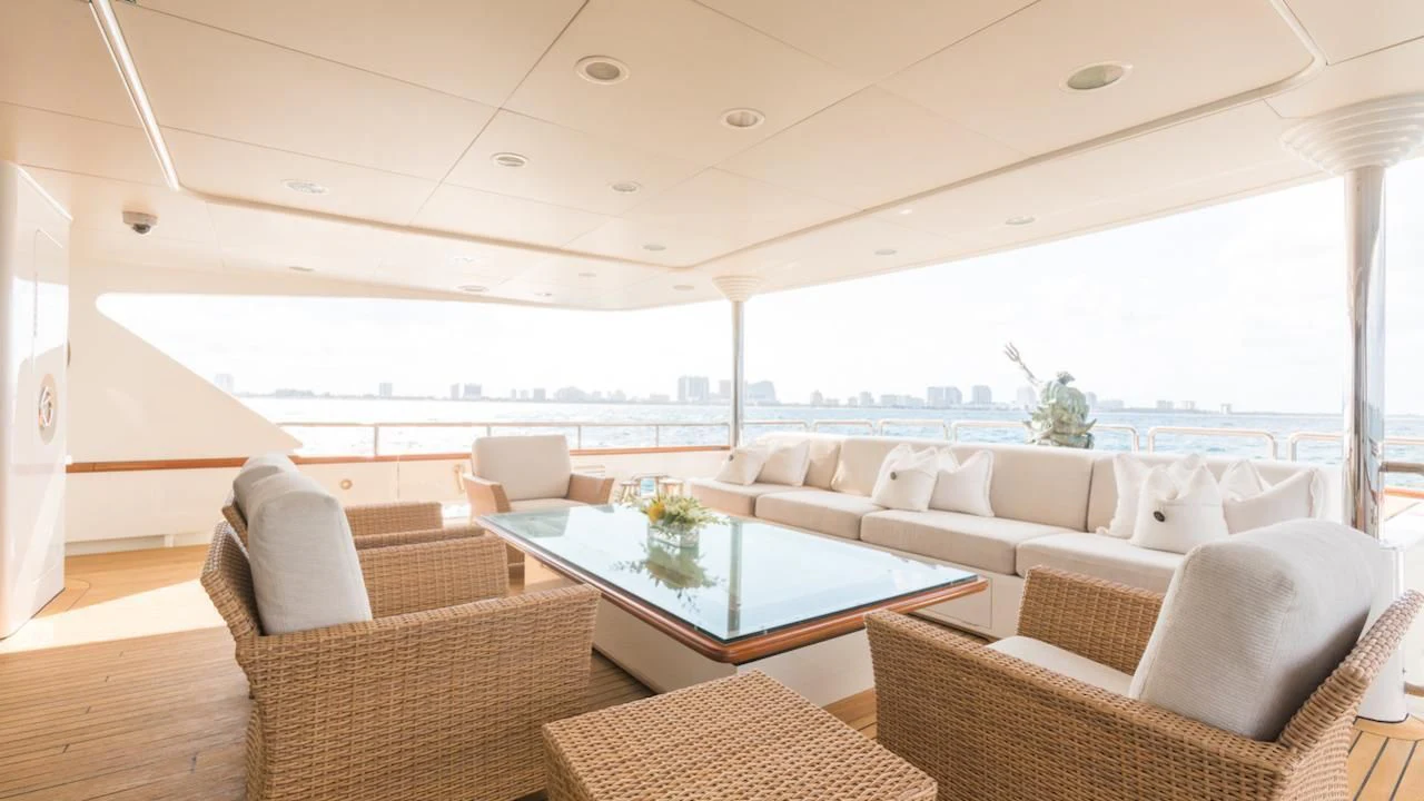 a living room with a large patio aboard BARENTS Yacht for Charter