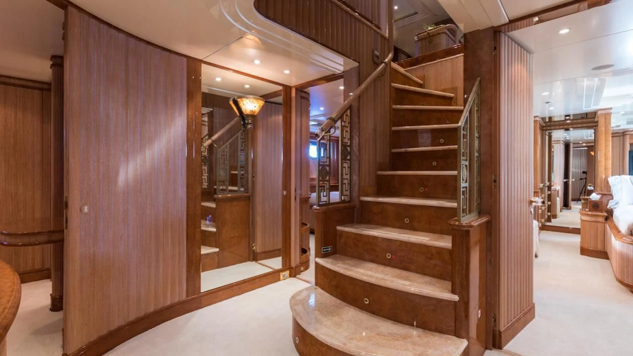 a staircase in a building aboard BARENTS Yacht for Charter