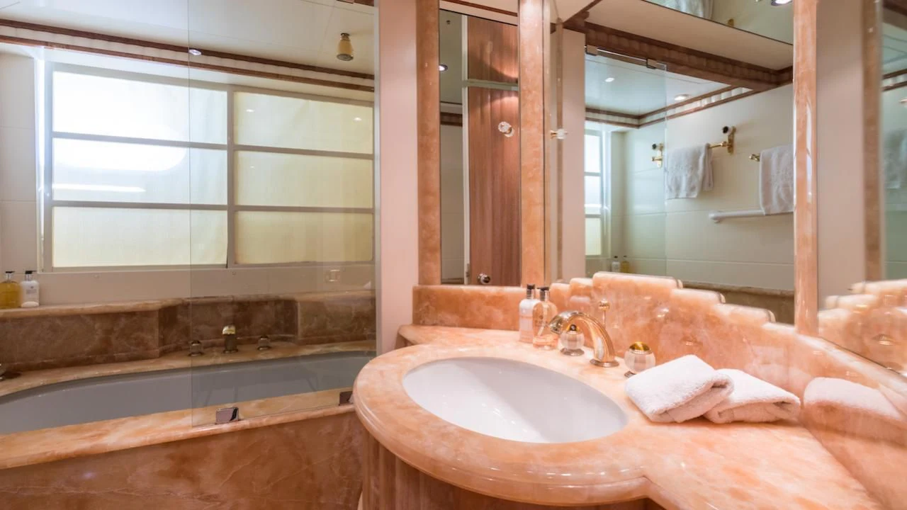 a bathroom with a large bathtub aboard BARENTS Yacht for Charter