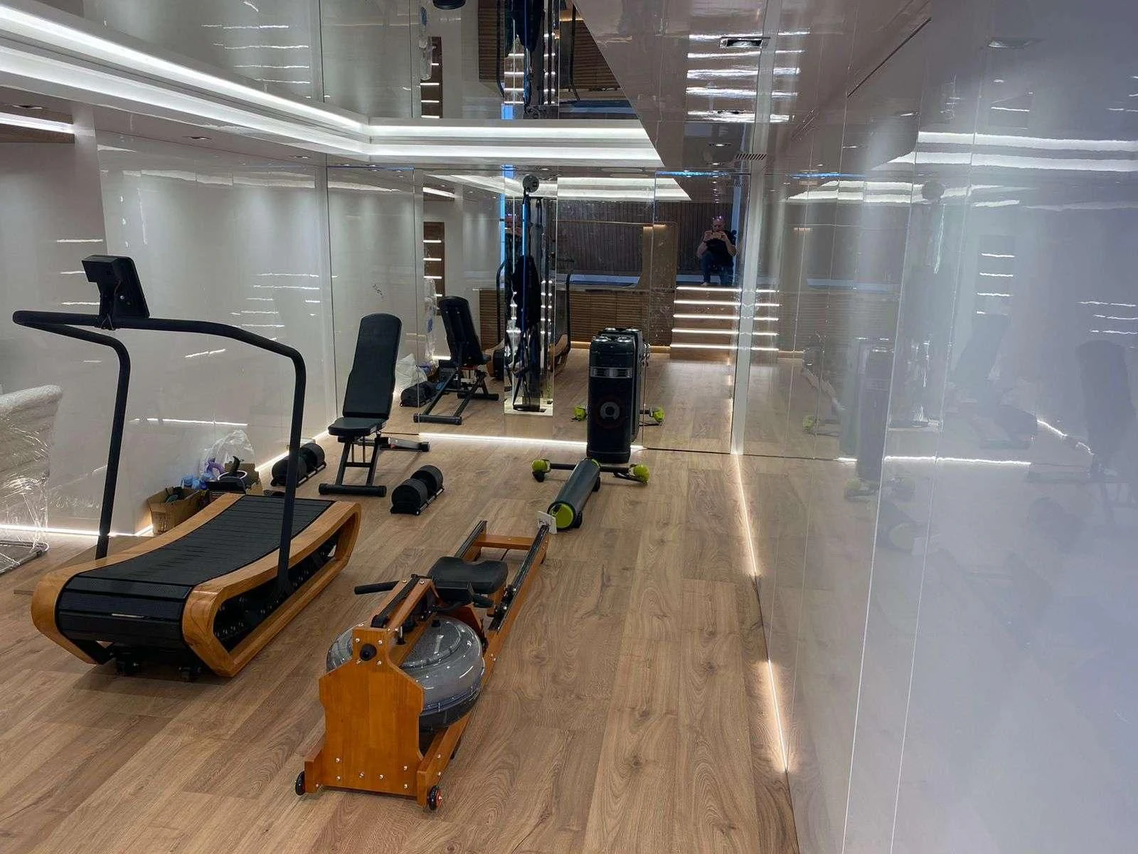 a large room with exercise equipment aboard BARENTS Yacht for Charter