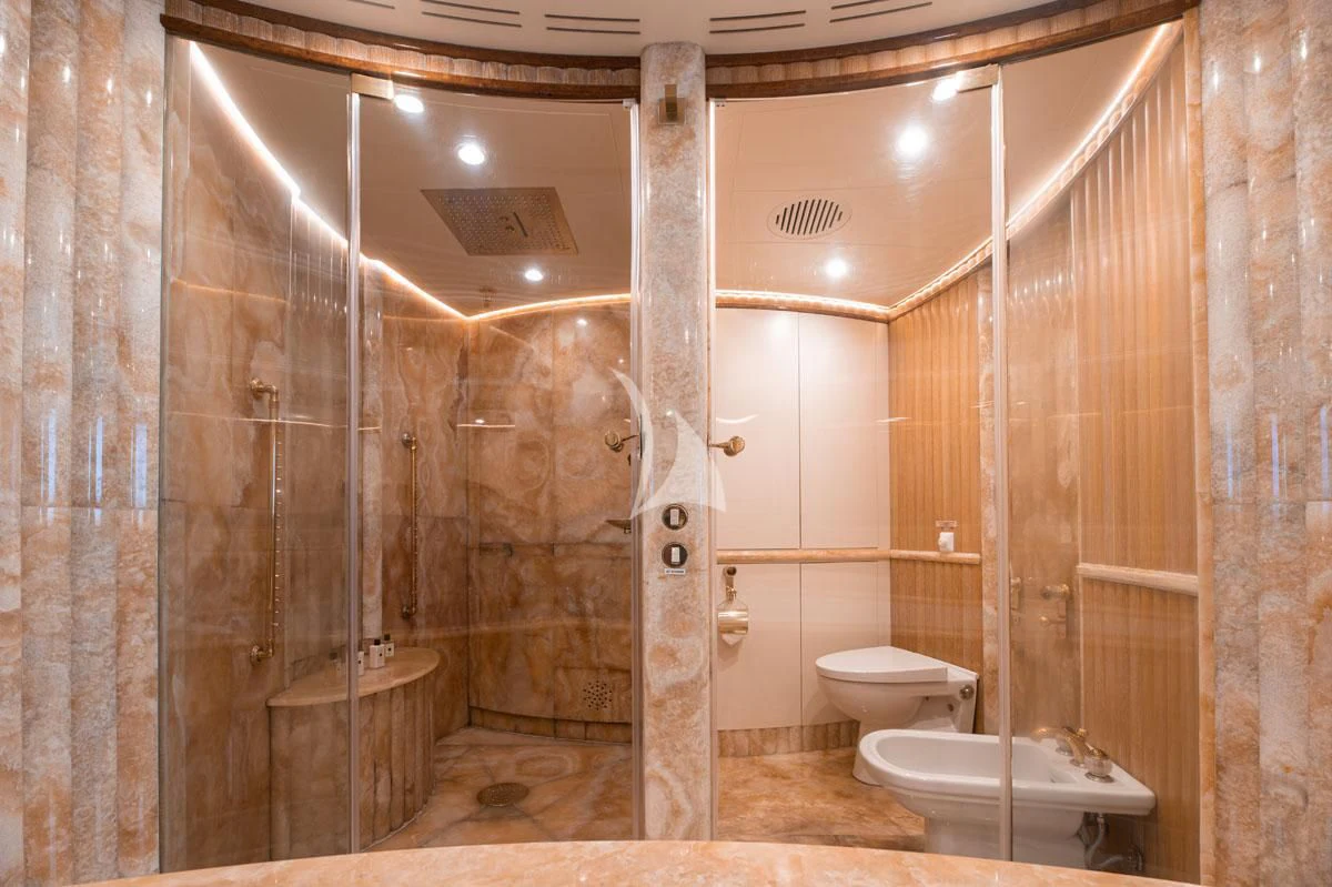 a bathroom with a shower and toilet aboard BARENTS Yacht for Charter