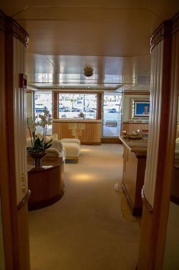 a living room with a large window aboard BARENTS Yacht for Charter