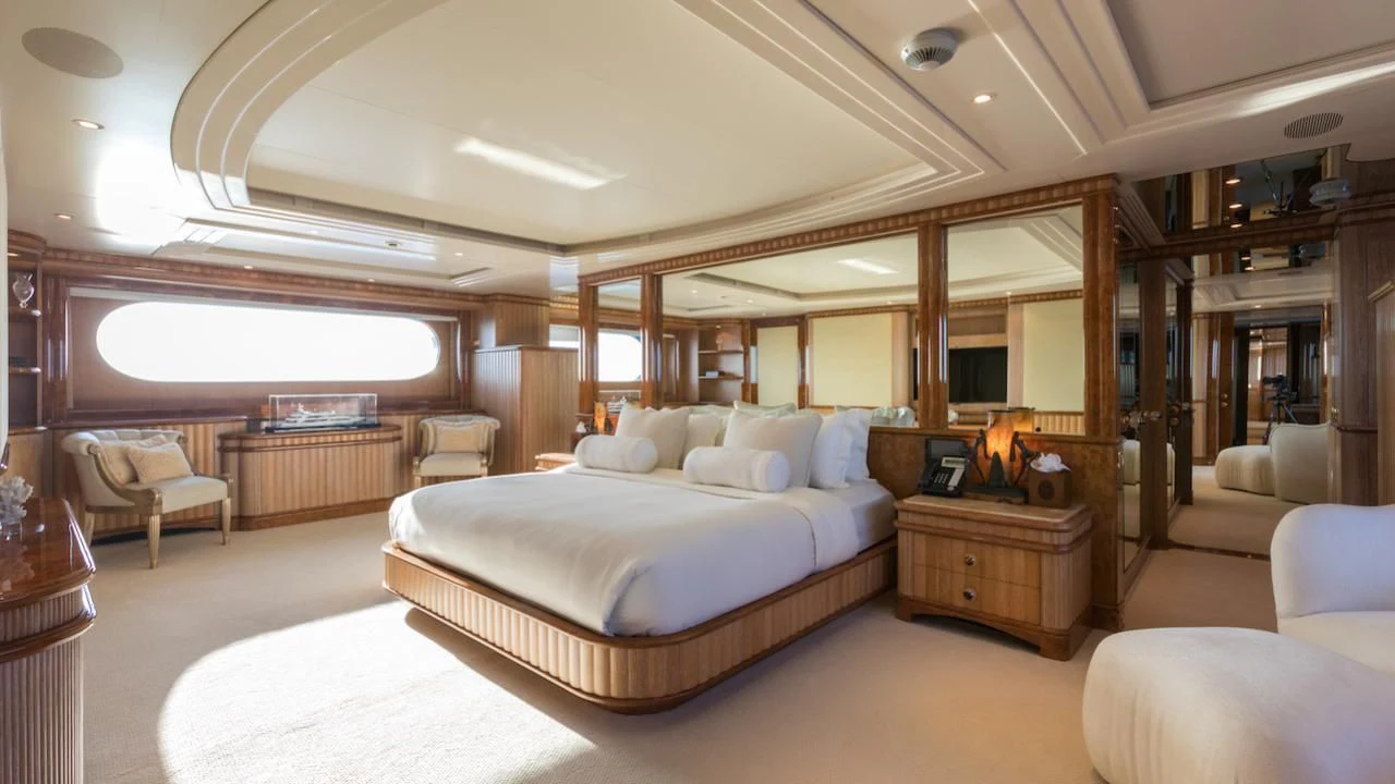 a large bedroom with a large bed aboard BARENTS Yacht for Charter