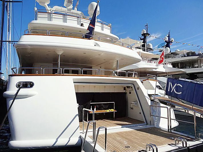a boat docked at a pier aboard BARENTS Yacht for Charter