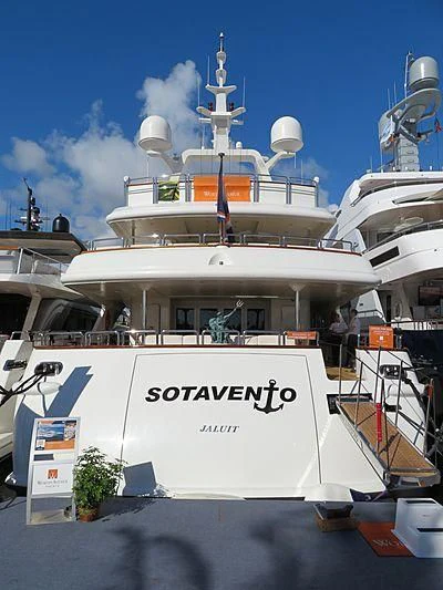 a large white ship aboard BARENTS Yacht for Charter