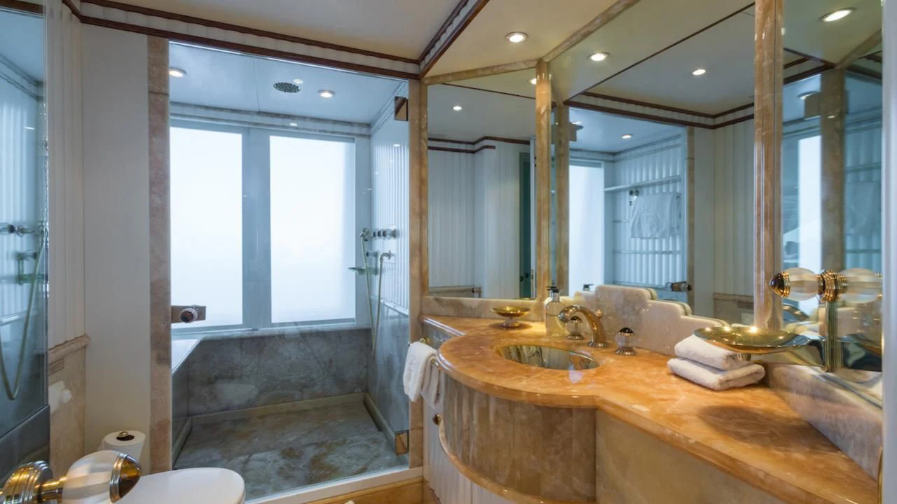 a bathroom with a marble counter top aboard BARENTS Yacht for Charter
