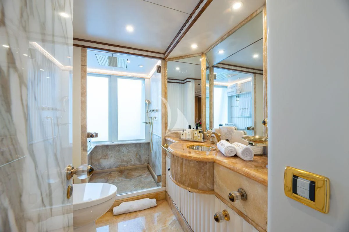 a bathroom with a sink and a mirror aboard BARENTS Yacht for Charter