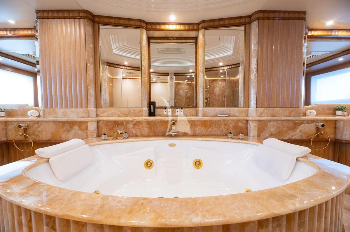 a bathroom with a large bathtub aboard BARENTS Yacht for Charter