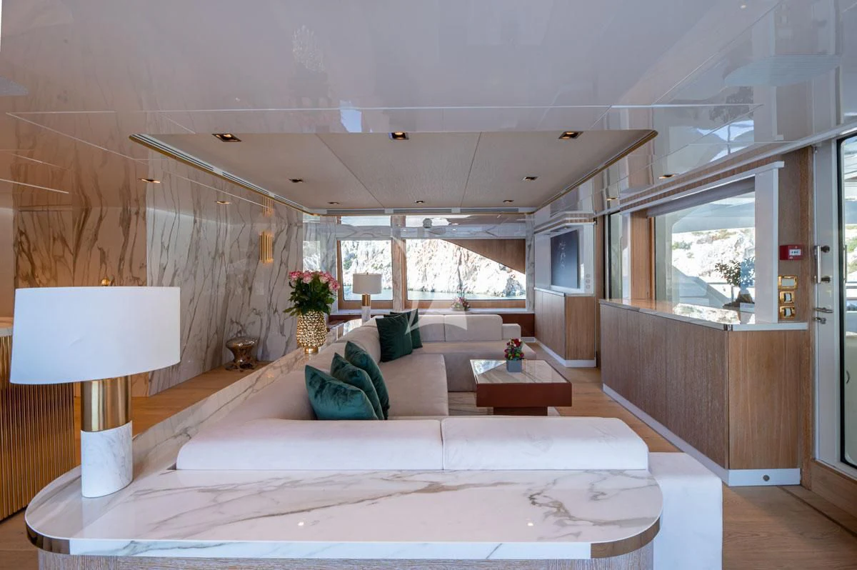 a large white bed in a room aboard BARENTS Yacht for Charter