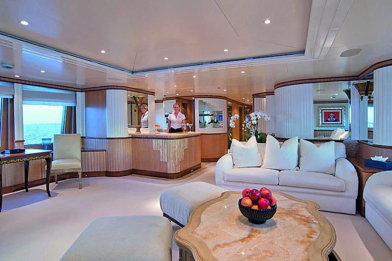 a large living room with a large window aboard BARENTS Yacht for Charter