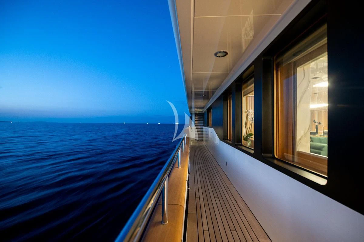 a deck with a view of the ocean and the ocean aboard BARENTS Yacht for Charter