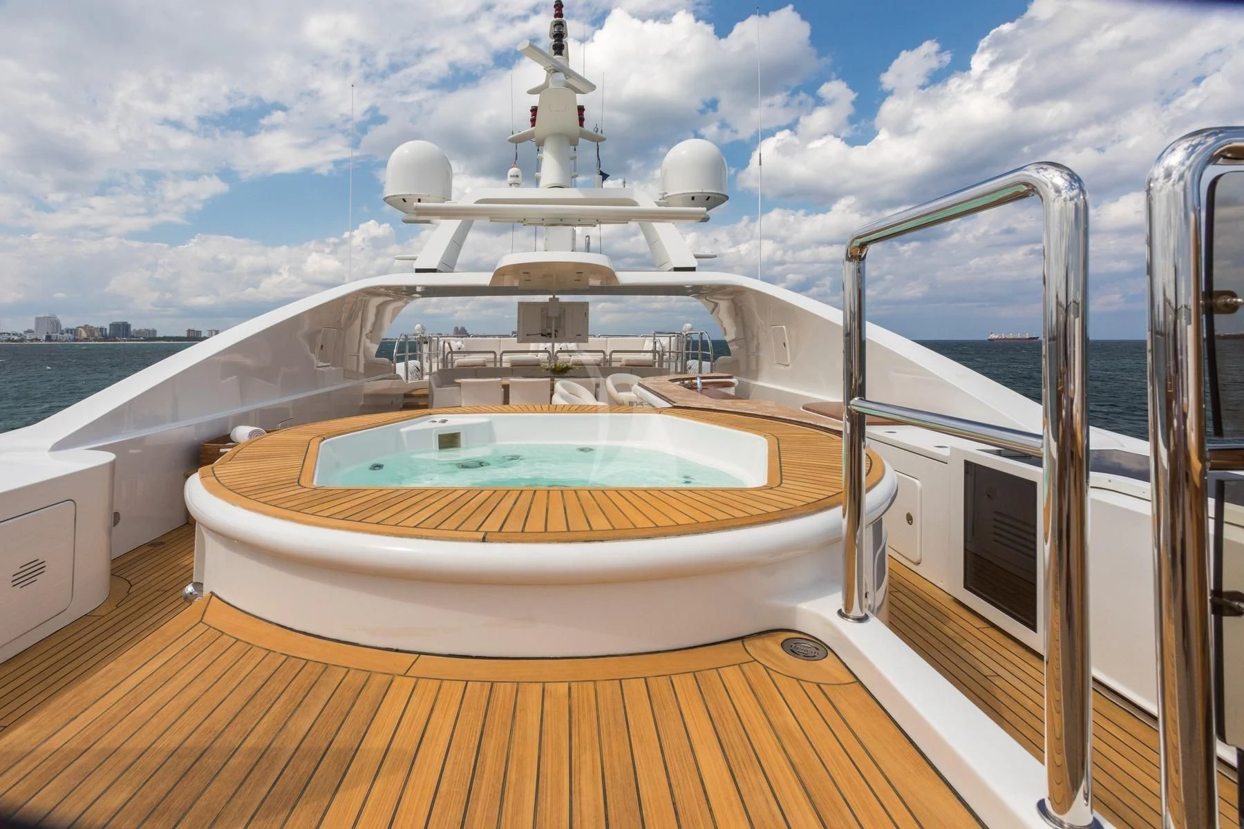 a large white boat on a deck aboard BARENTS Yacht for Charter