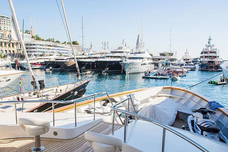 a group of boats in a harbor aboard BARENTS Yacht for Charter