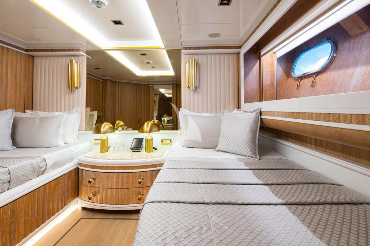a room with two beds aboard BARENTS Yacht for Charter