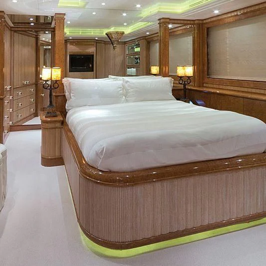 a large bed in a room aboard BARENTS Yacht for Charter