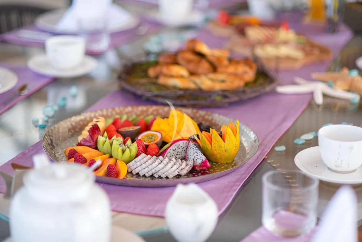 a table with food on it aboard BARENTS Yacht for Charter