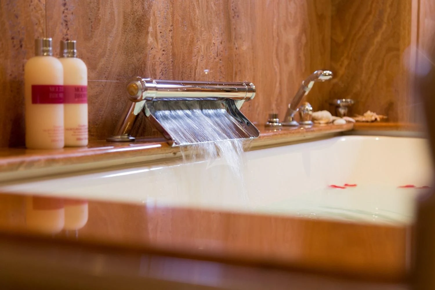 a sink with a faucet aboard FRIENDSHIP Yacht for Charter