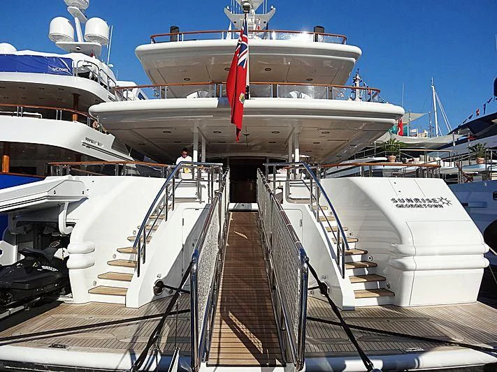 a large cruise ship docked aboard FRIENDSHIP Yacht for Charter