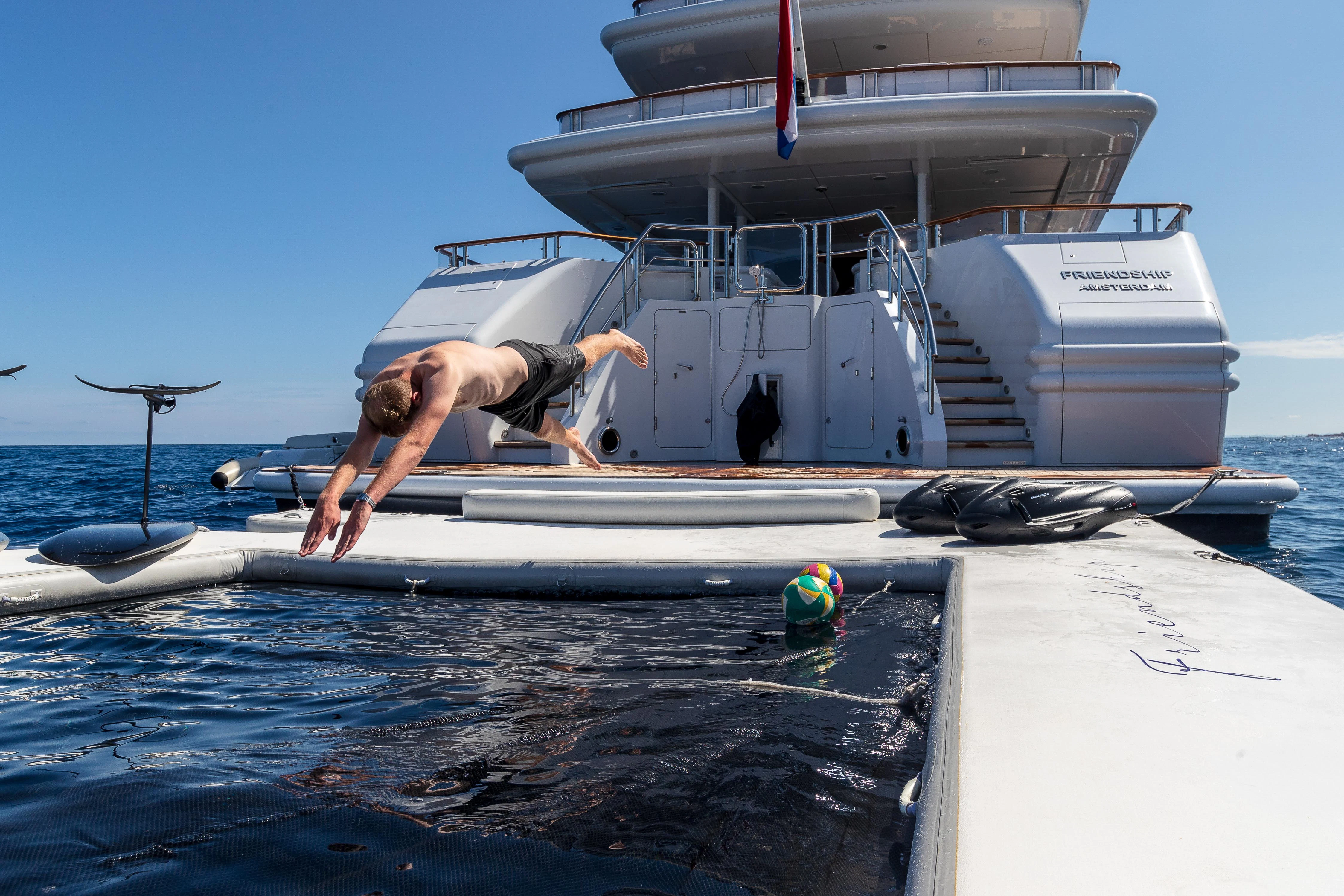 a person lying on a boat aboard FRIENDSHIP Yacht for Charter