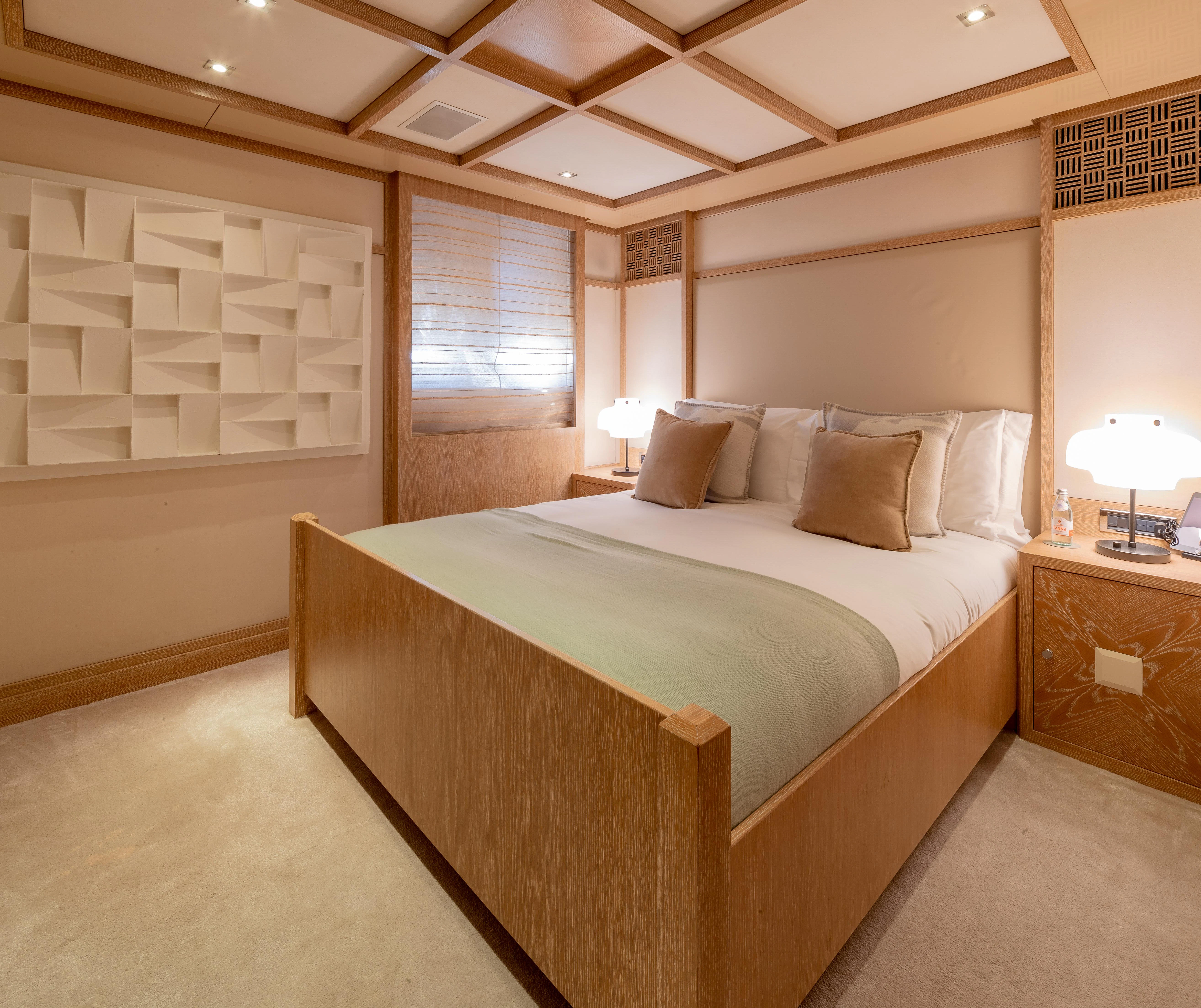a bed in a hotel room aboard FRIENDSHIP Yacht for Charter