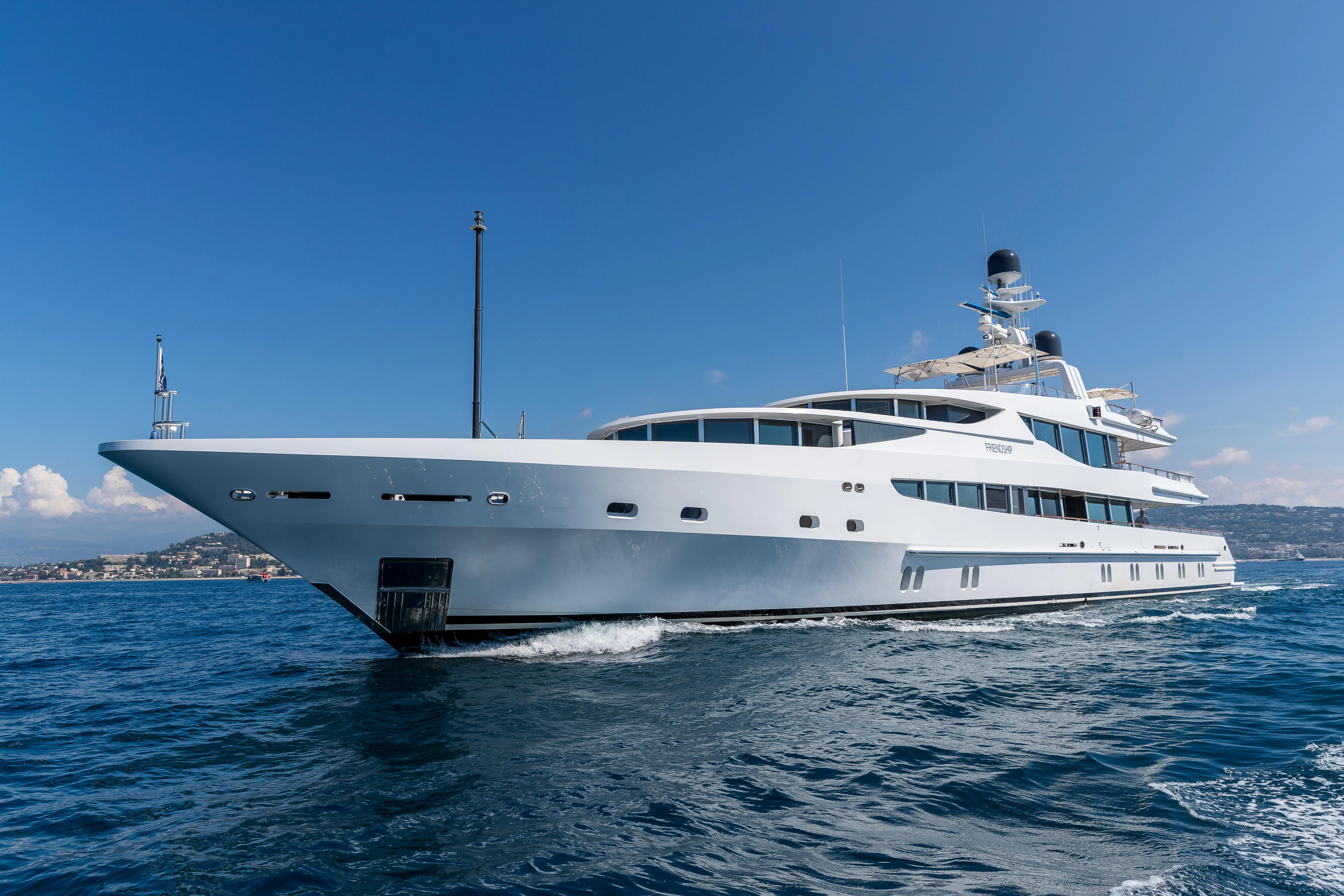 a white yacht on the water aboard FRIENDSHIP Yacht for Charter